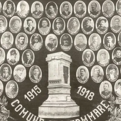 Italian World War I memorial wall listing the fallen (caduti).